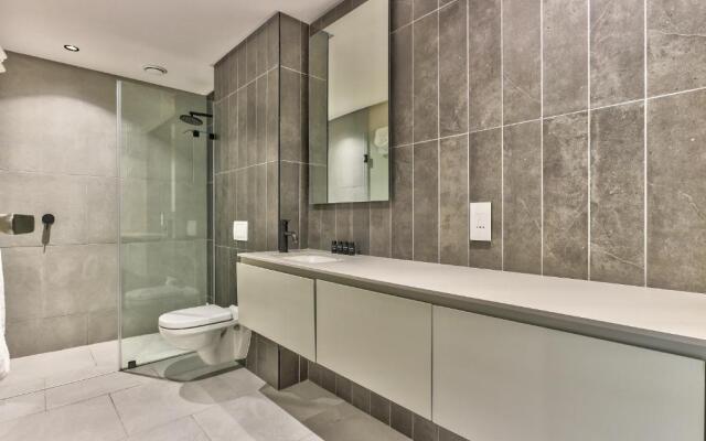 One Bedroom With Balcony and City Views