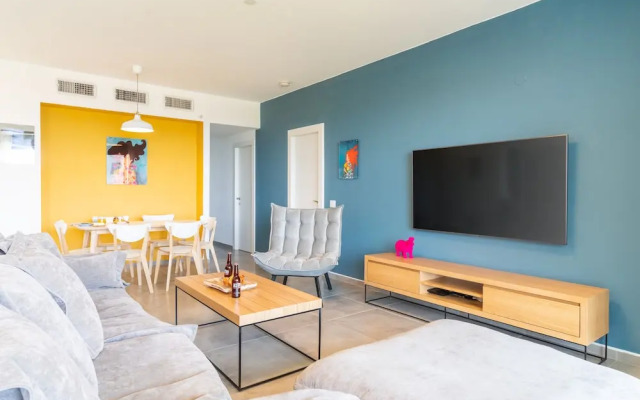 Vibrant Seaside Stay with Balcony by Sea N' Rent