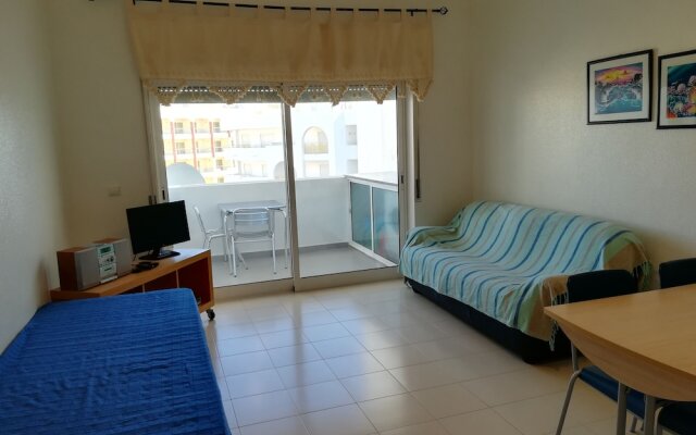 Apartamento Praia de Porches,izibookings