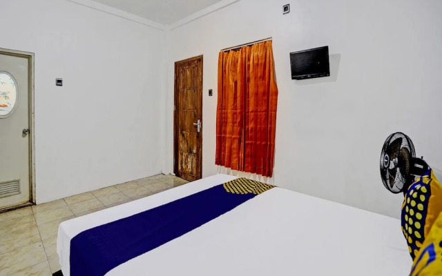 SPOT ON 92452 Griya Sandi Residence Family NearPantai Boom