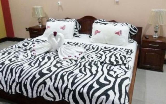 Oguaa Apartments & Lodging