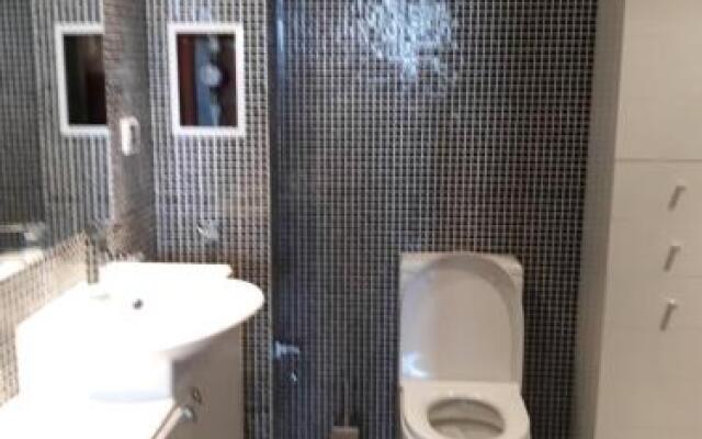 Apartment Sand Lilies