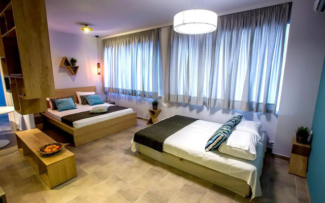 Emerald Suites & Studios