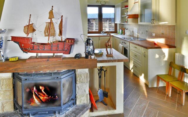 Holiday Home by Lake Rosnowskie With Boat