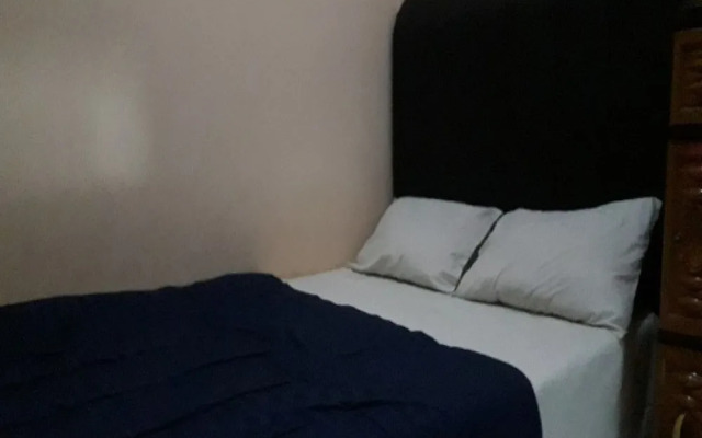 OYO 90706 Kost Alam Jaya Syariah