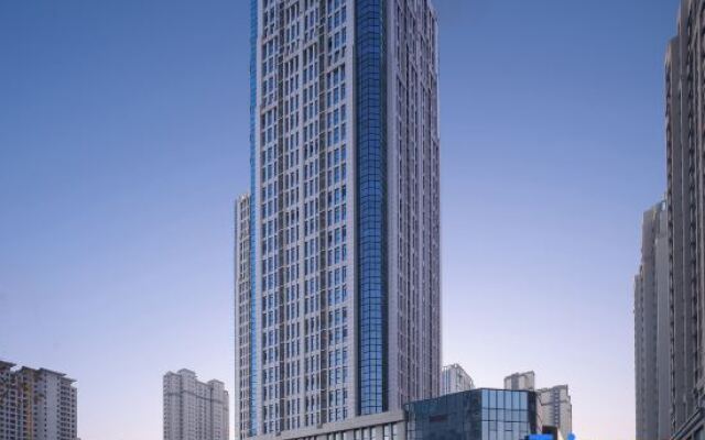 Qianna Meisu Hotel (Xinxiang Municipal Government High-speed Railway Station)