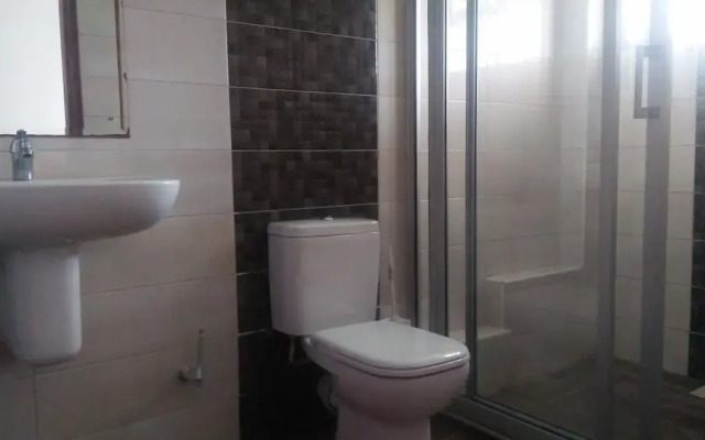 Esao Airport Suites