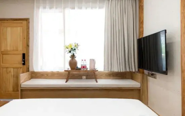 Heart pleasure Yaji Rizhao Jinshan Snow Mountain Scenic Inn (Shuhe Ancient Town Branch)