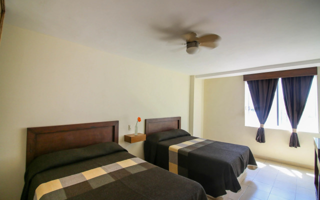 Capital O Hotel Casa Blanca