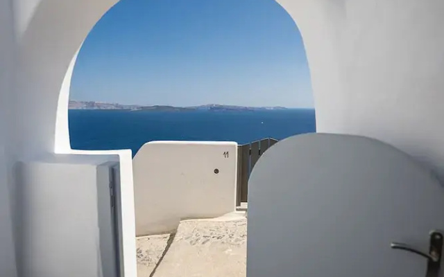 Three Domes Oia - an Iconic Collection