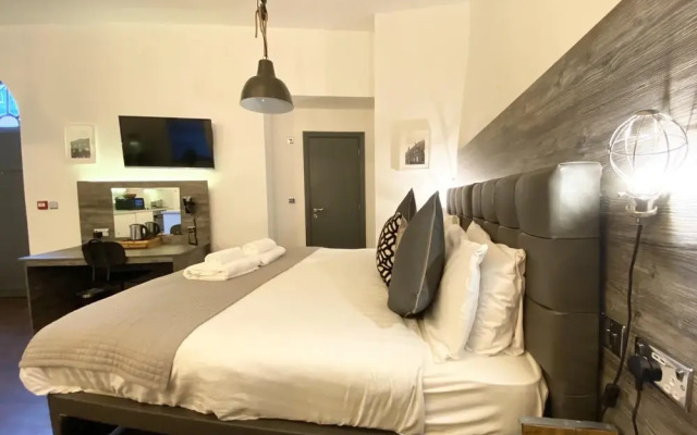 Studio at The Coach House Apartments