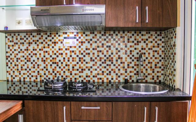 Comfortable and Tranquil 2BR Apartment at Green Pramuka By Travelio