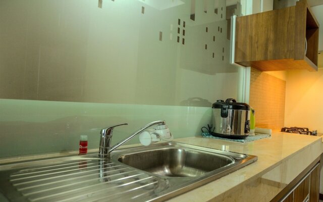 Cozy Pool View Kemang Village Residence Apartment with Direct Access To Mall
