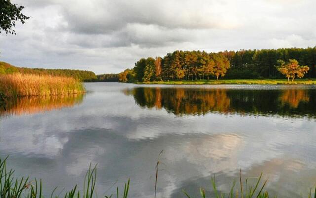 Holiday Home by Lake Rosnowskie With Boat