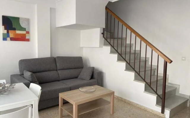 Vivienda adosada a 150m de la playa + patio + wifi