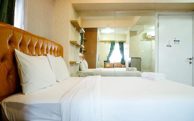 Furnished Studio with Comfortable Design Green Pramuka Apartment
