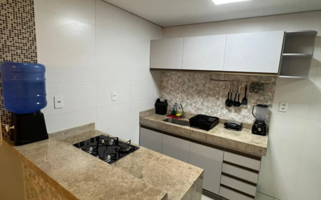 Casa em Condomínio agradável com fundo pro rio