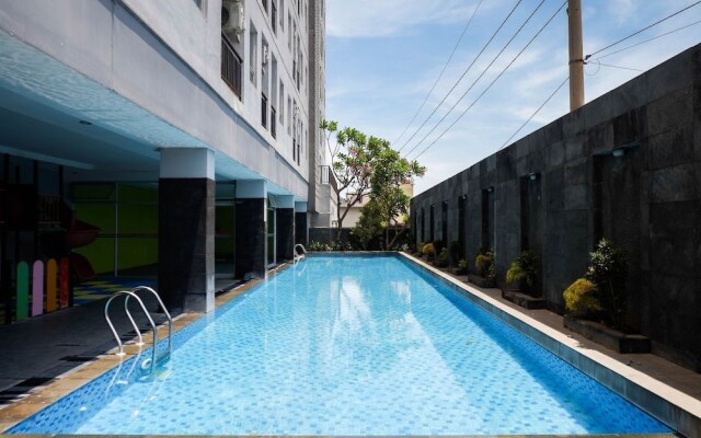 Compact And Comfy Studio At Puri Mas Apartment