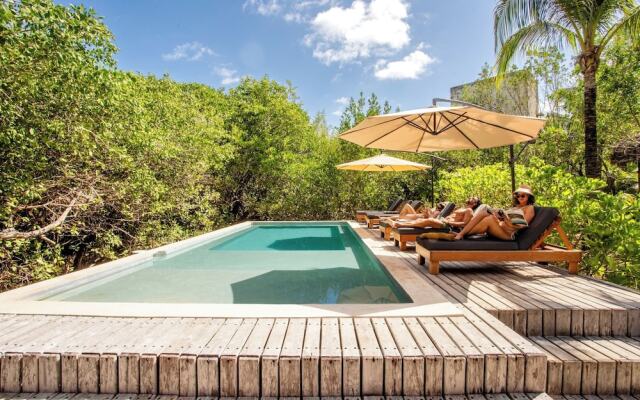 Tulum Vida Silvestre Cabañas