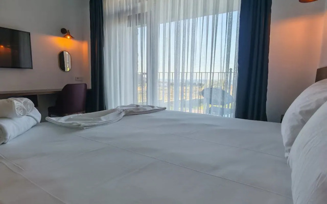 Rigani Gökçeada (+14)