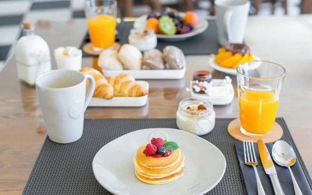 Miragaia Riverside Suites.