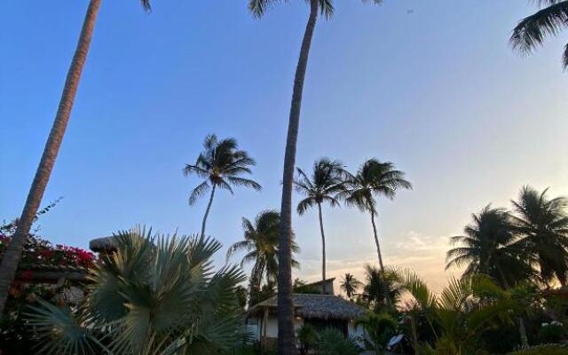 Tiki Pool's Bungalows