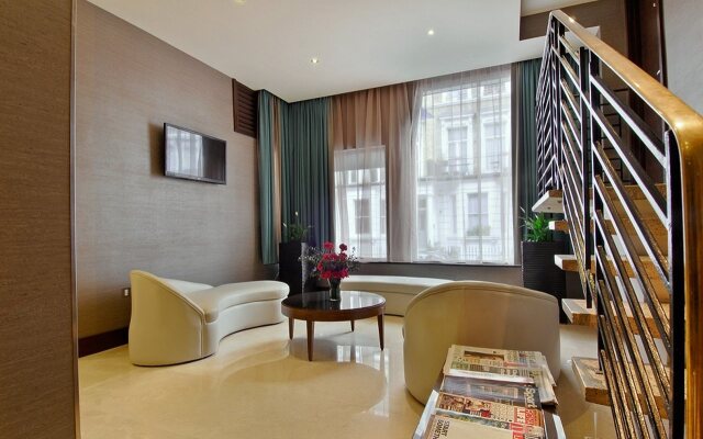 Отель The Cura Kensington