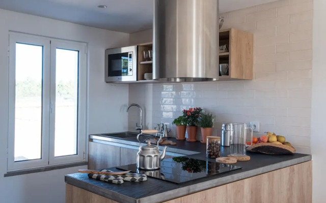 Craveiral Farmhouse by Belong