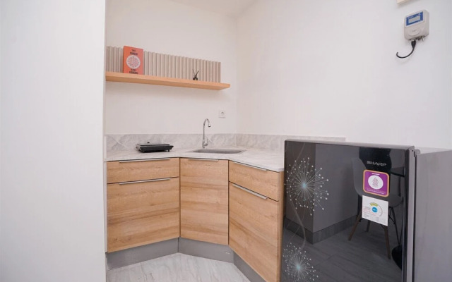 Good and Cozy 2BR at Collins Boulevard Apartment