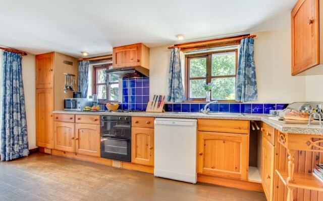 Characteristic Stone Farmhouse in Hilly Devon near Sea