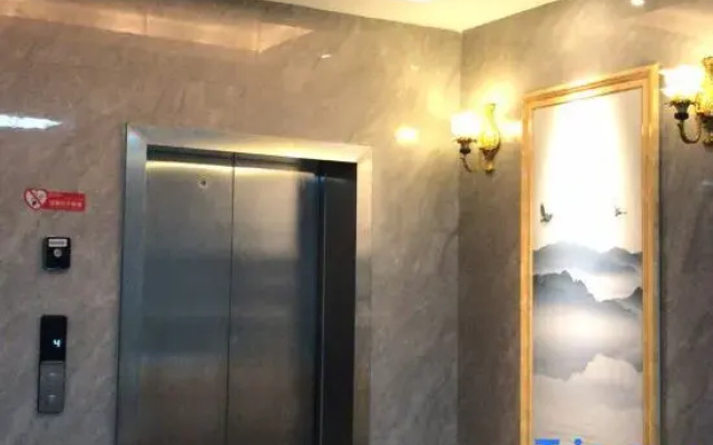 Pingle Xingfu Hotel