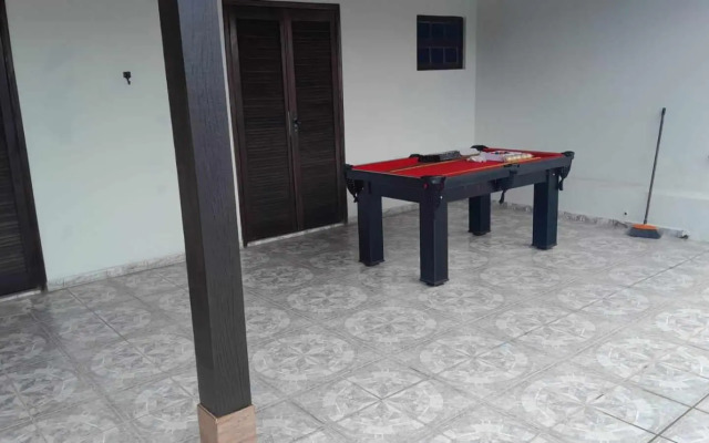 CASA DE PRAIA CARAGUA COM Piscina