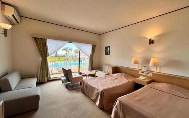 Coral Palms – Guest Rooms – Amami