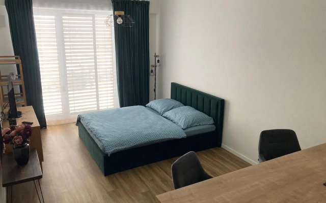 Moderný apartmán/garzónka v centre NR