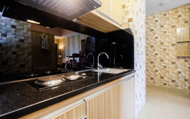 Cozy 1Br Apartment With Workspace At Mustika Golf Residence