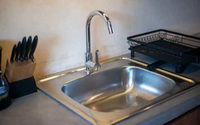 Guest INN Home - Elements Suites