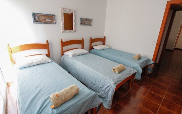 150m da praia com piscina aquecida e sauna