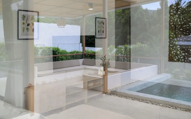 Tropical Poolside Retreat by Sea N' Rent