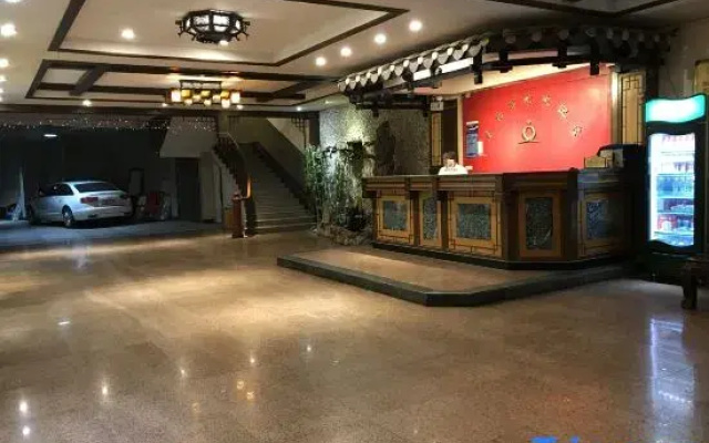 Pingle Xingfu Hotel