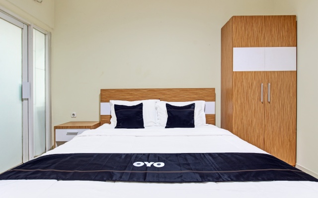 OYO 90253 DHelomi