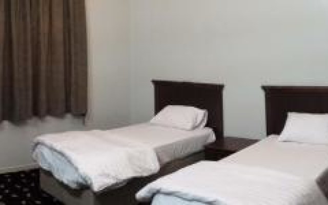 Al Corniche Hotel Suites & Villas