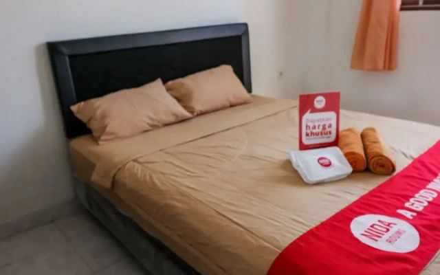 Nida Rooms Gelogor Carik Denpasar at Guest House Orchid