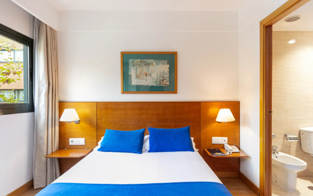 Отель Sercotel de los Reyes