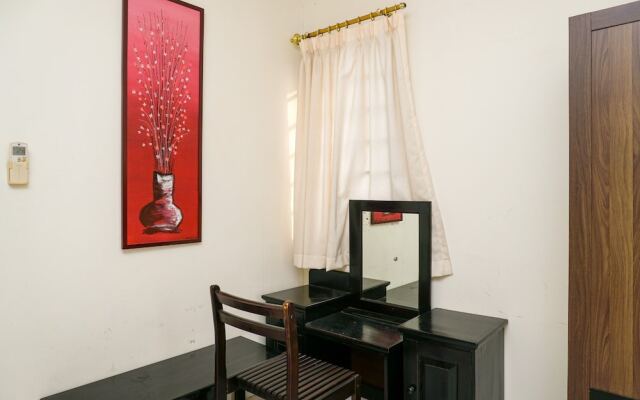 Clean and Homey 1BR at Puri Garden Apartment