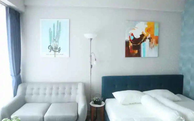 Apartemen Grand Kamala Lagoon Cozy by Lotus Property
