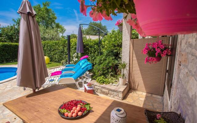 Nicely decorated semi-detached house with pool and  fenced yard