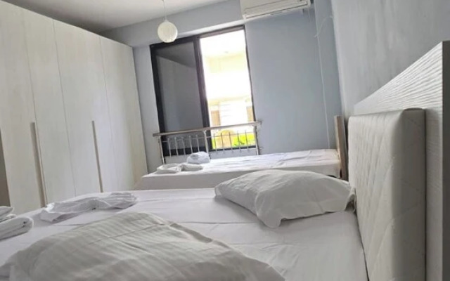 Tirent Apartment - Cozy Bedrooms Stay by Golem Beach.
