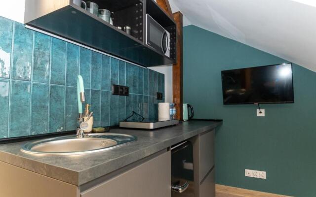 Uroczy, przytulny apartament poddasze