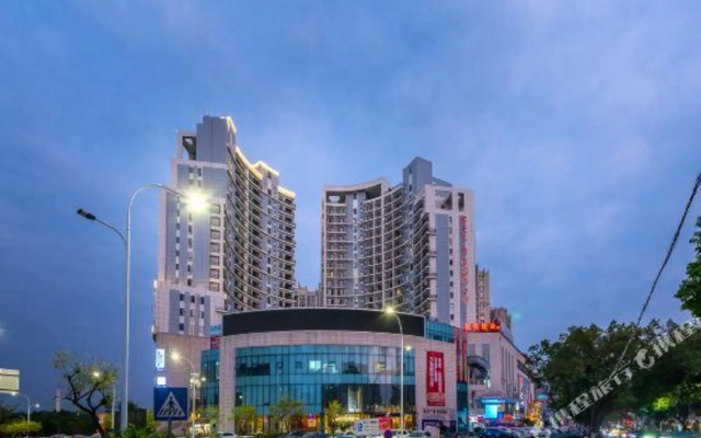 Manfei Theme Apartment (Meizhou wanda plaza Branch)