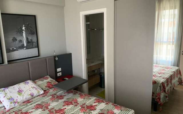 Quarto e Sala Particular em Aparthotel